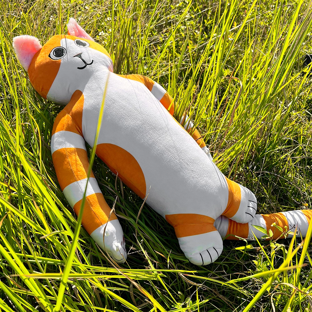 A large, hand-crafted hugging plush toy named Orwa, designed with soft high-stretch fabrics, flexible arms, and a cozy body perfect for warm, comforting hugs. Ideal for emotional comfort and cuddles.