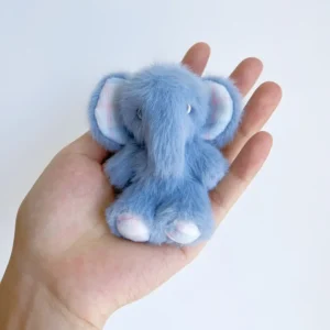 Handmade plush elephant toy named Elma, soft and comforting, designed for emotional support and gentle cuddles.